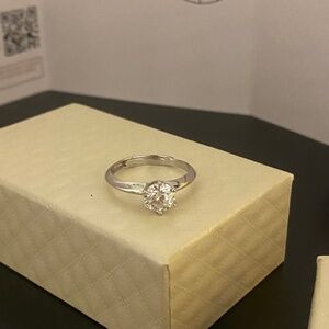 Moissanite halo engagement ring